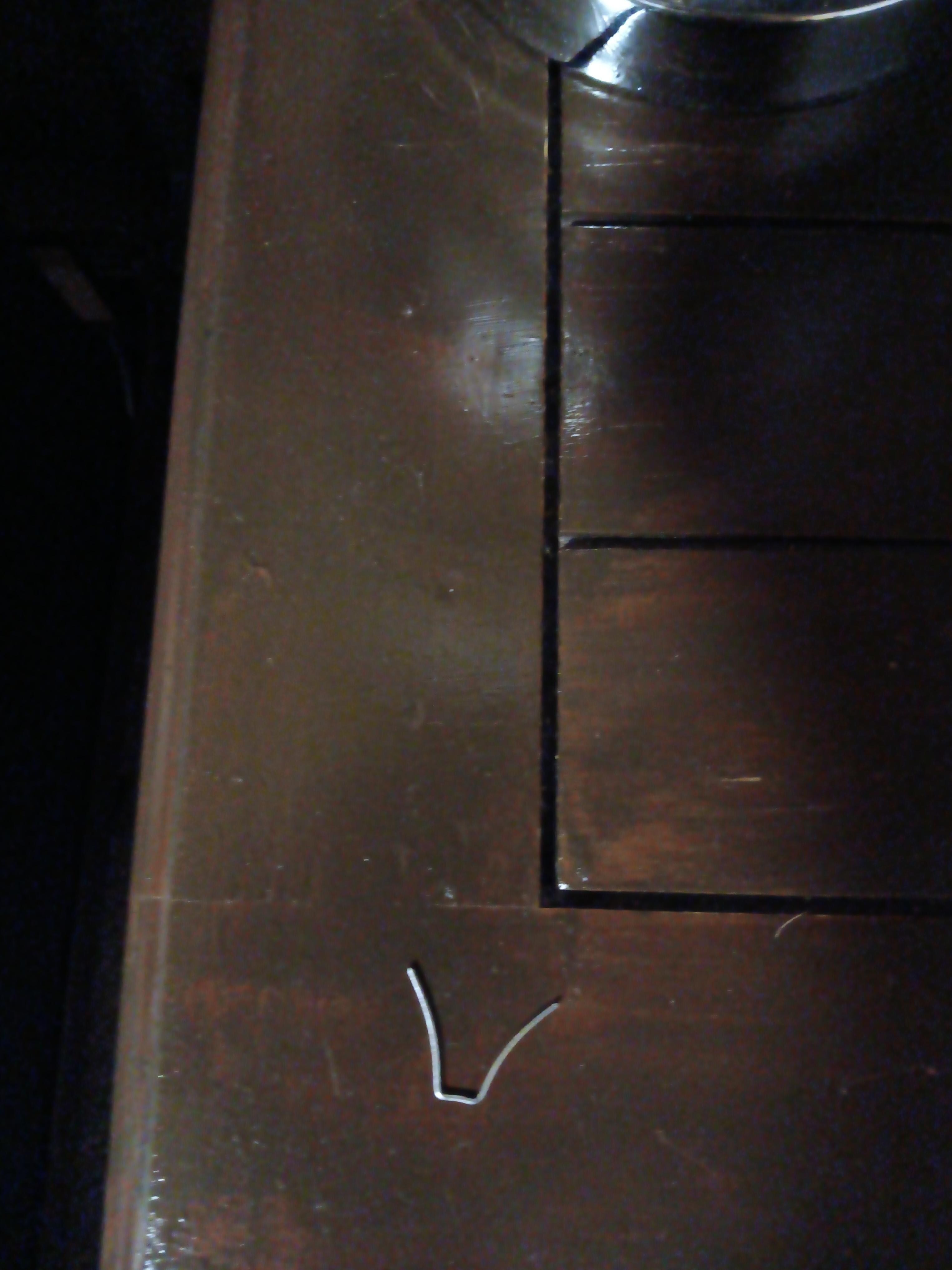 Trim stapple found by my leg when getting into bed. It was under the sheet inbedded in the plush part of the mattress.