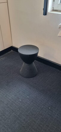 Wipe-clean stool, doesn't look like it has ever been cleaned