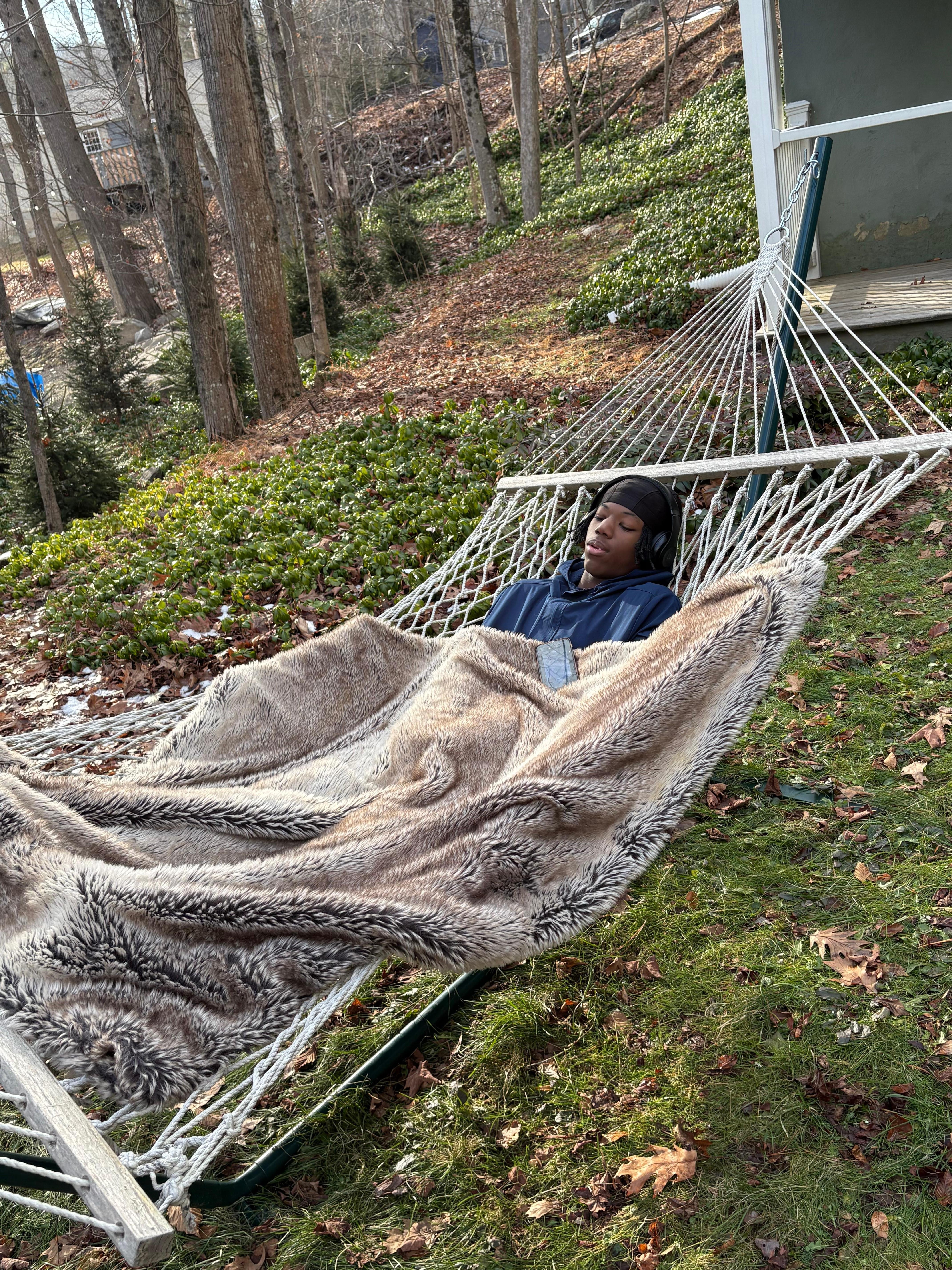 Grandson chilling in the hammock, until he thought a deer would show up!