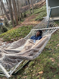 Grandson chilling in the hammock, until he thought a deer would show up!