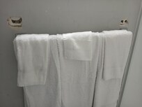 Towel rack had fallen off, left hole and just put it back on below original place.