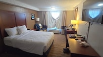 The room is basic no frills. The carpet could really use a shampoo cleaning... it was kinda gross. The mattress was a little too soft for my taste and the pillows are too fluffy- over-filled for my taste. They didn't have any flatter pillows.