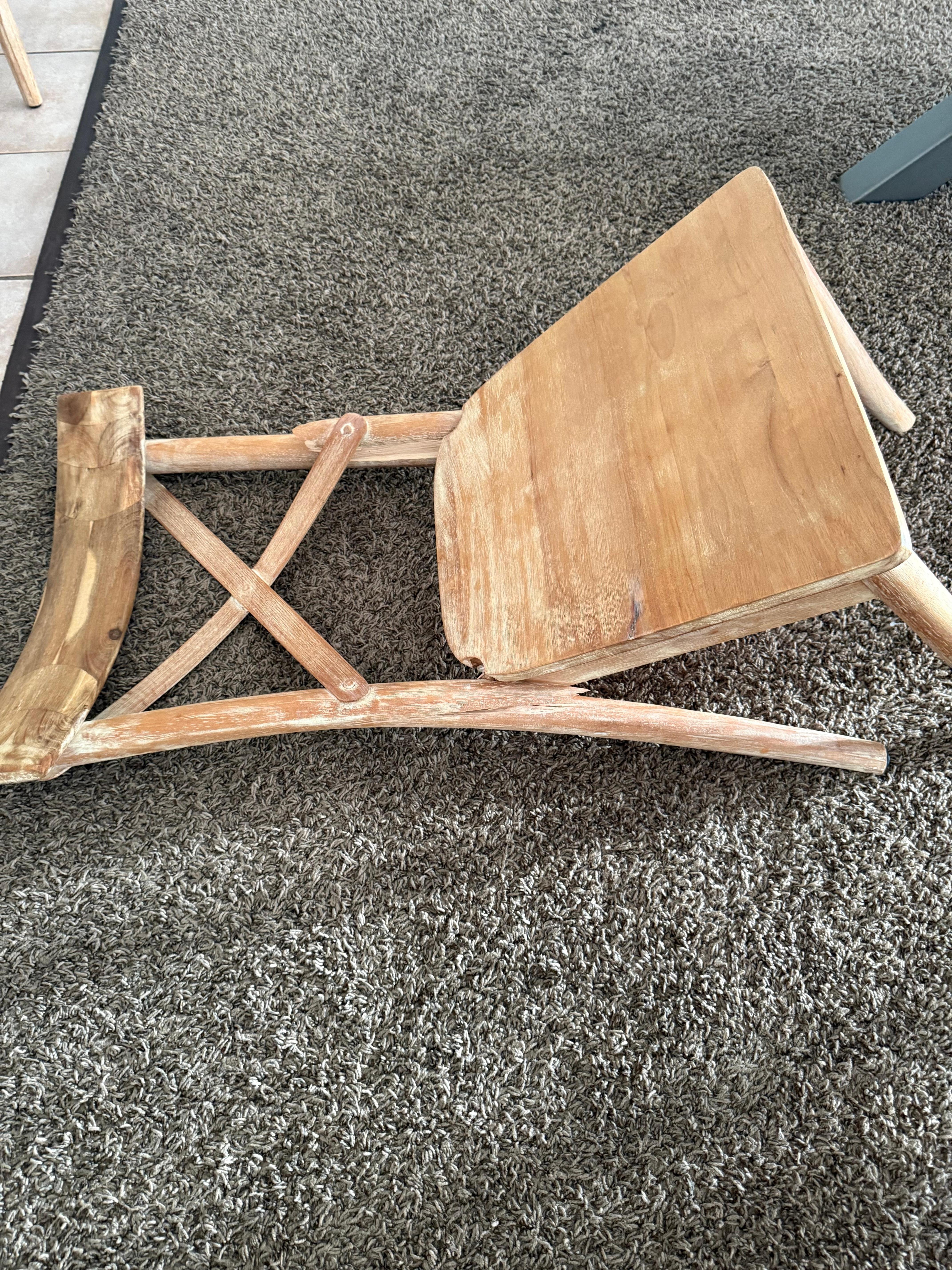 The chair that was broken that I sat in a fell out of. 