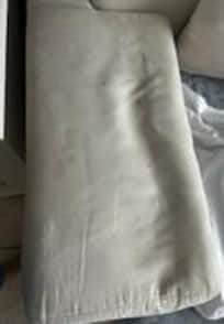 Couch (under the slipcovers and dog pads).
