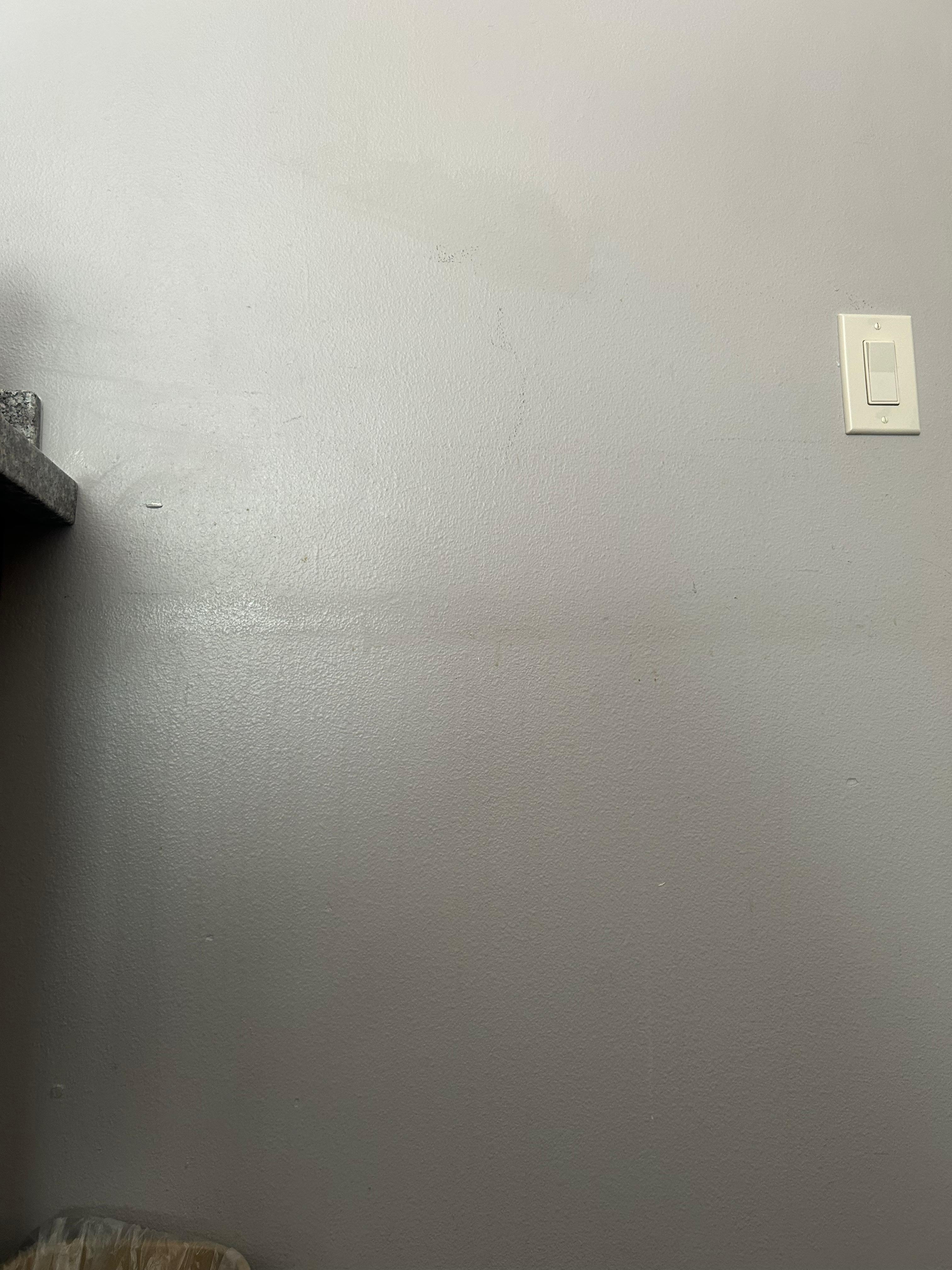 Some type of liquid all over the wall 