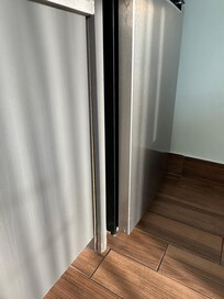 Damaged trim piece falling off